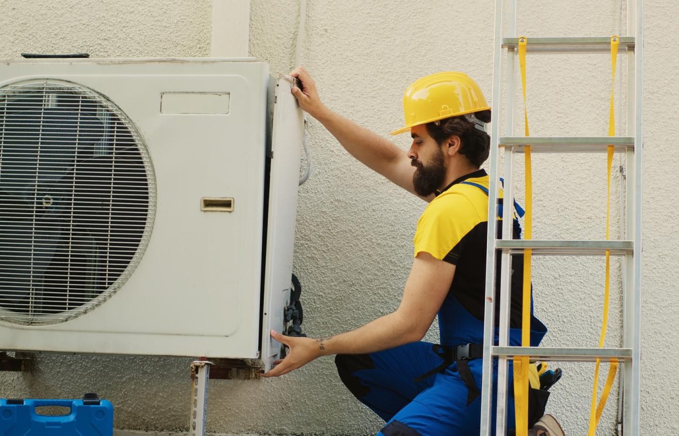 wireman-dissasembling-air-conditioner_482257-91015